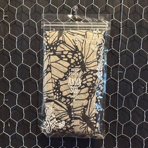 Anna Sui x Free People collab Monarch Butterfly Tights in Black